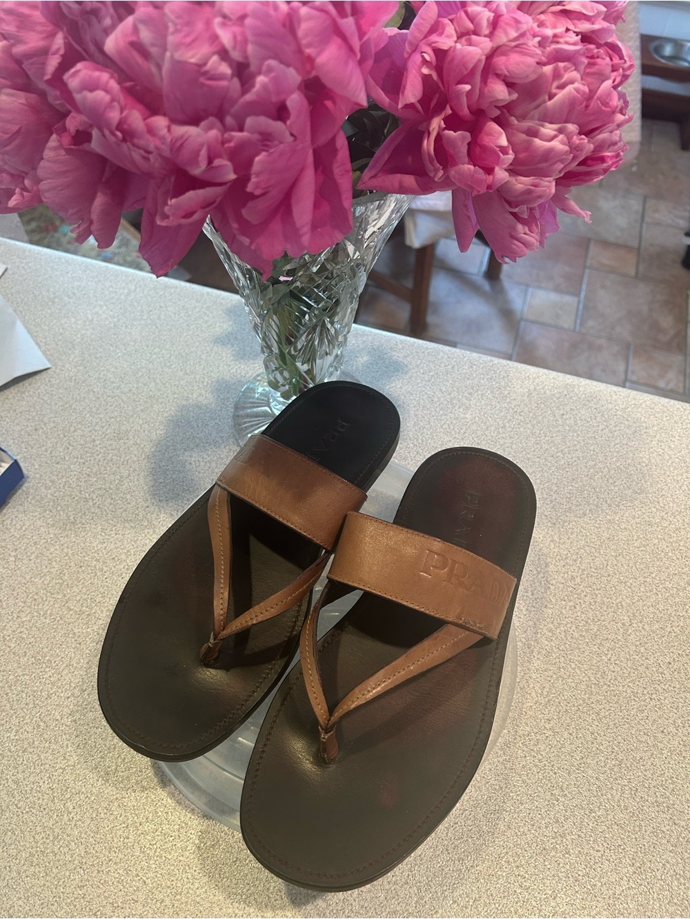 Prada men’s leather flip flops